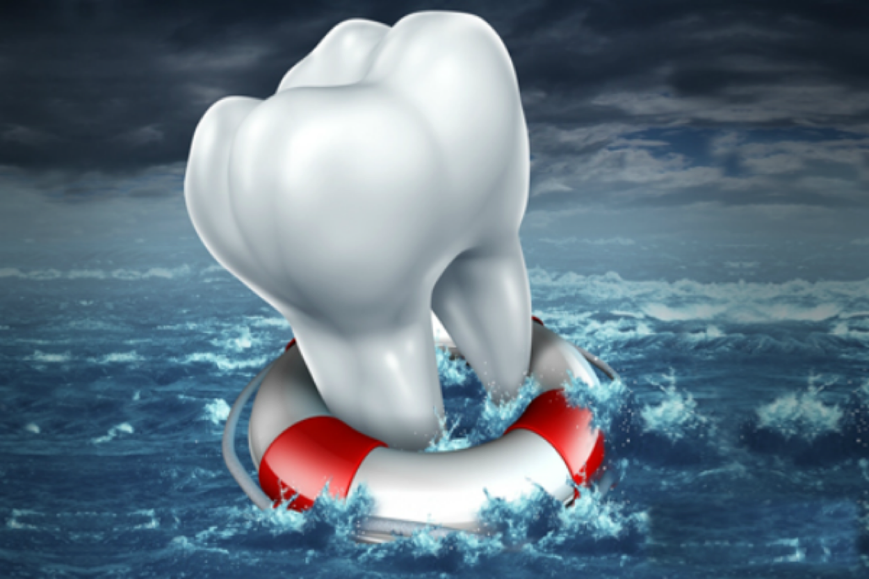 an illustration of a tooth in a life preserver floating in the sea.